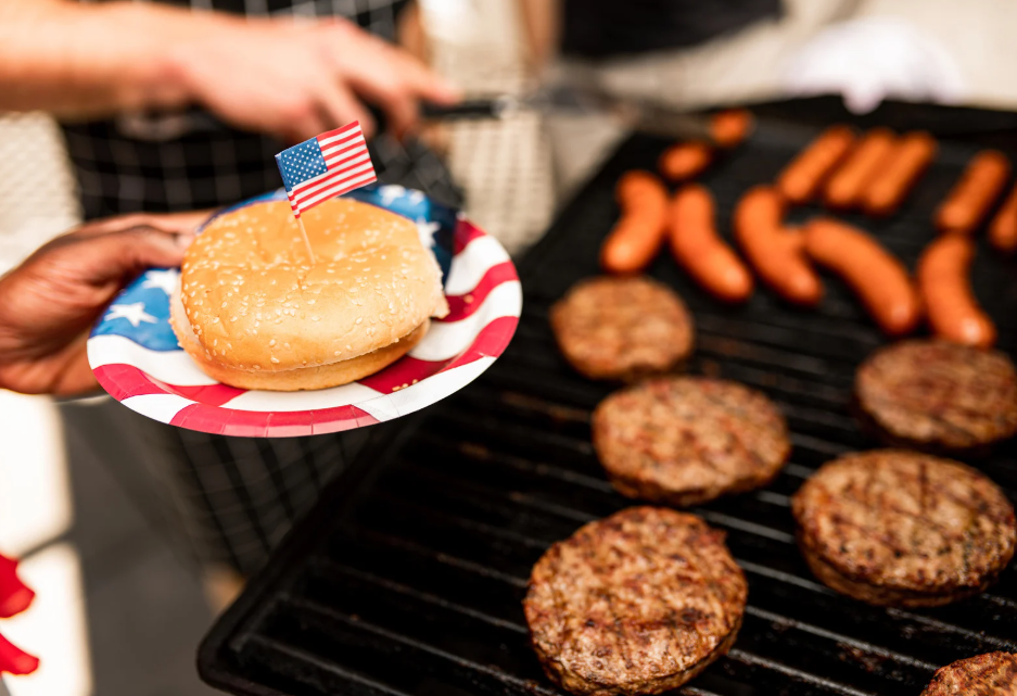 burgers and dogs on the grill