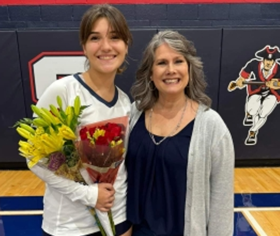 host mom and girl at senior night