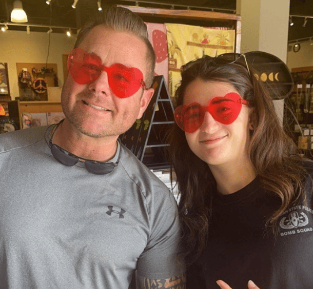 teen girl and host dad wearing heart glasses
