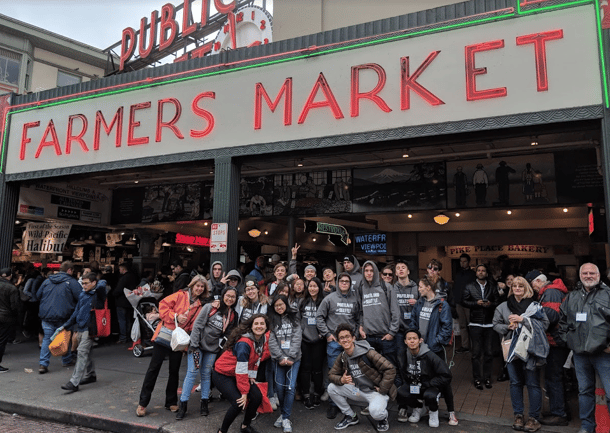 group of teens in front of Farmer's Market