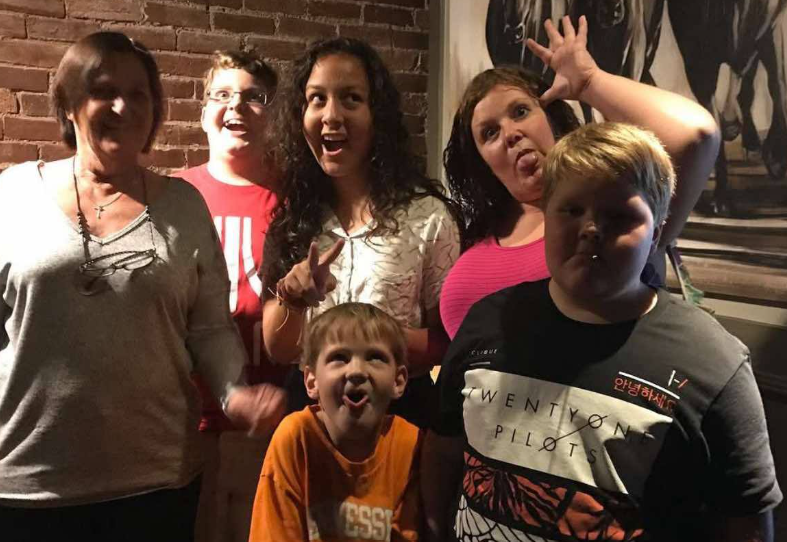 family making silly faces