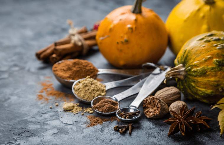 measuring spoons with fall spices