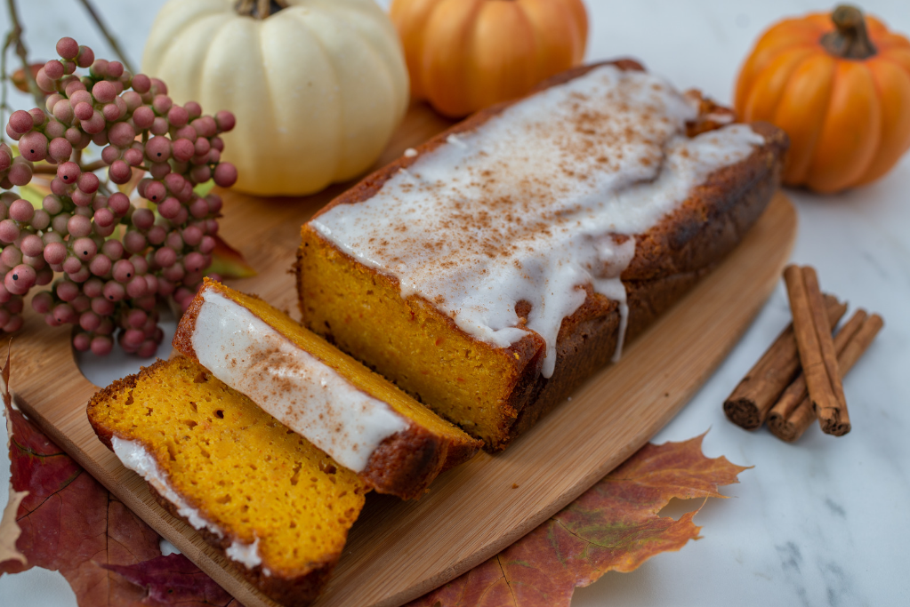 pumpkin bread topped with glaze and spice