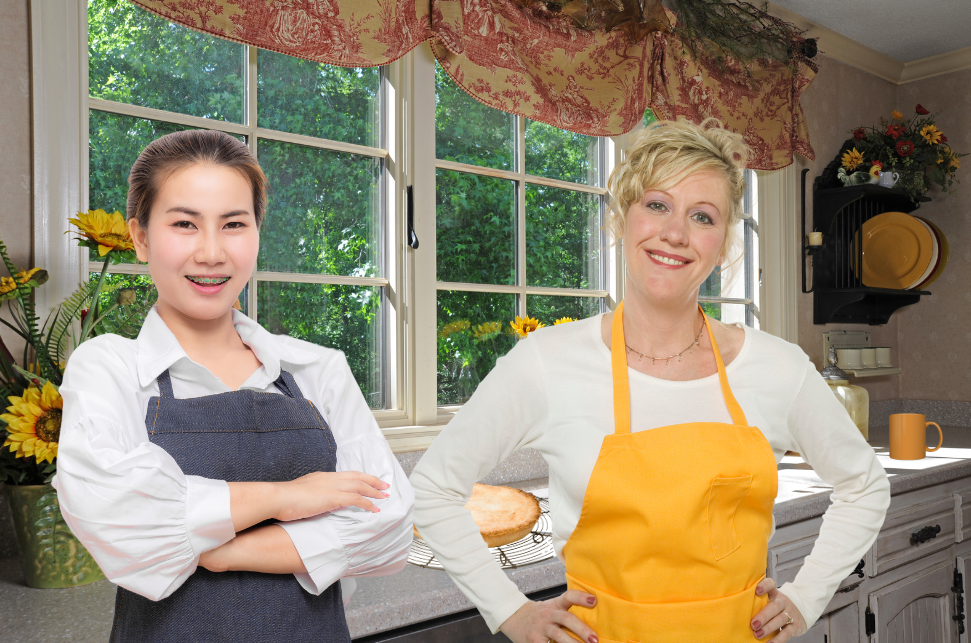 host mom and exchange student in aprons