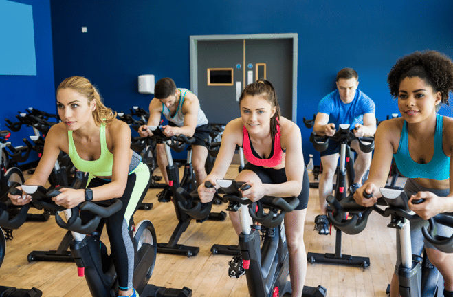 teens at a spinning class