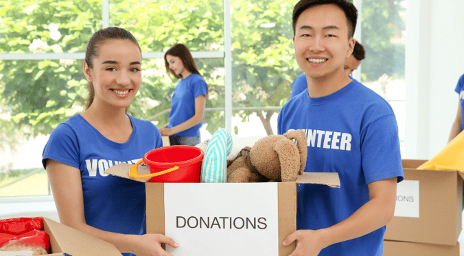 two teens collecting donations