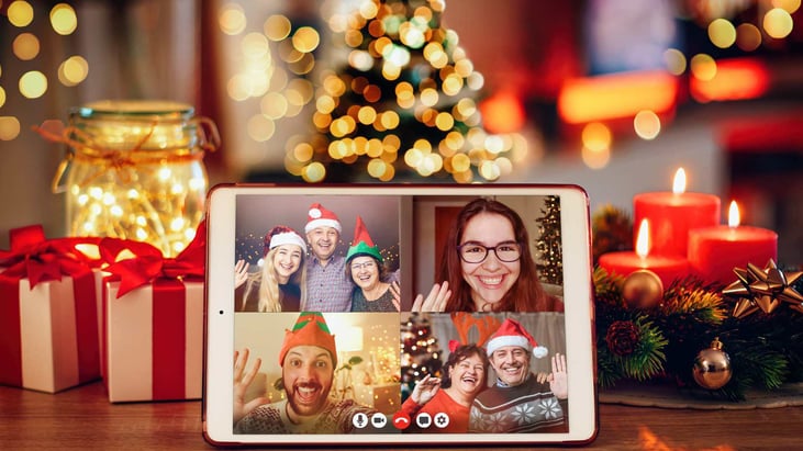 ipad with images of family video call at christmas