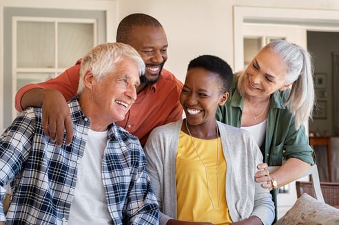 two couples laughing