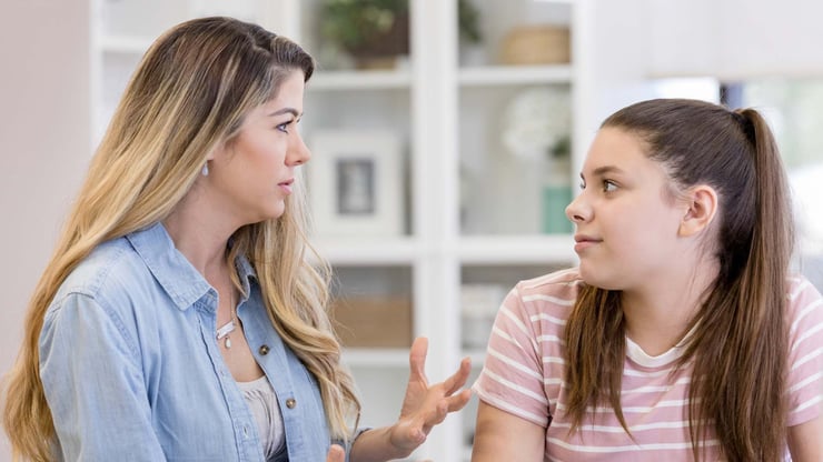 mother speaking to teenage girl-1