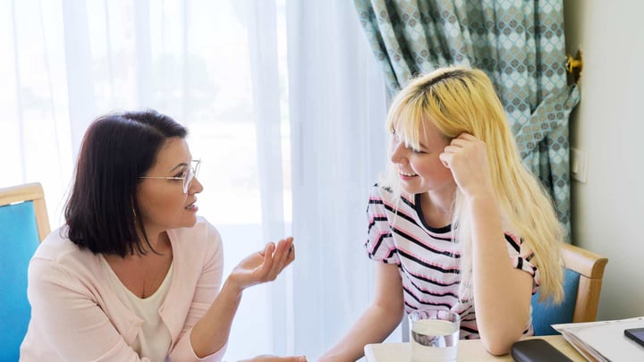 mother speaking to teenage girl