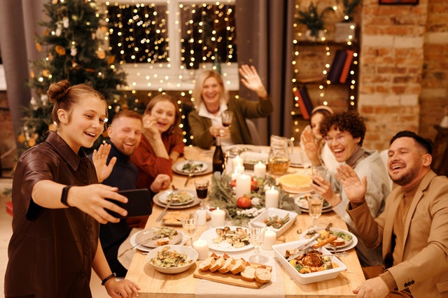 family selfie at the Christmas dinner table