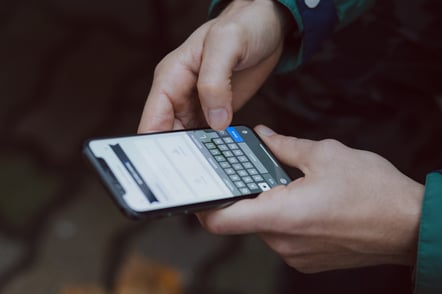 male hands texting