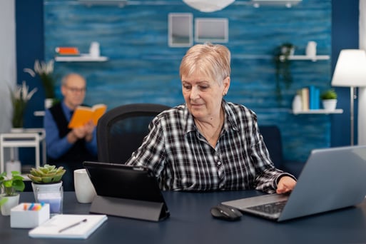 senior woman working at computer