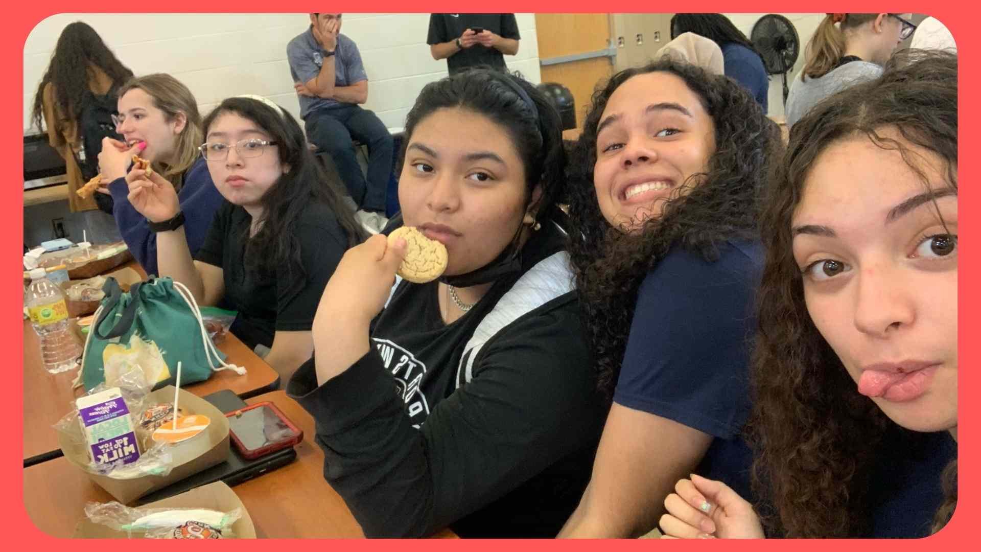 smiling students in high school cafeteria