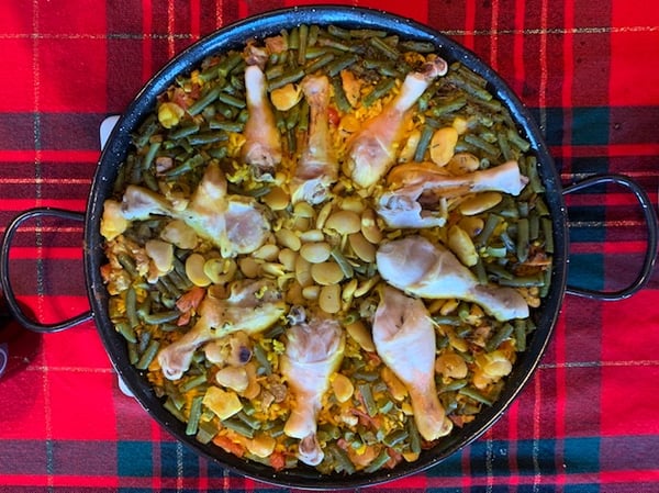 Spanish paella on a red table cloth