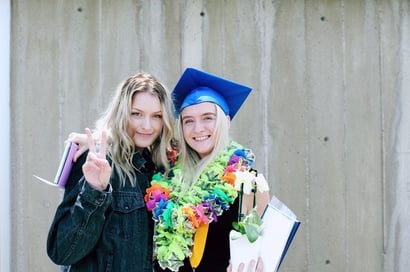 graduate and friend