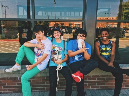 four teenage boys