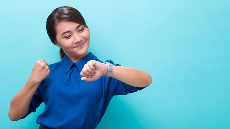 teen girl looking at watch