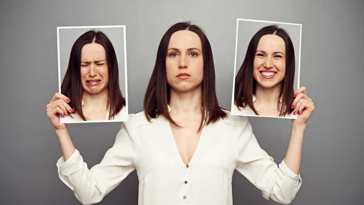 woman displaying happy, sad and neutral facial expressions