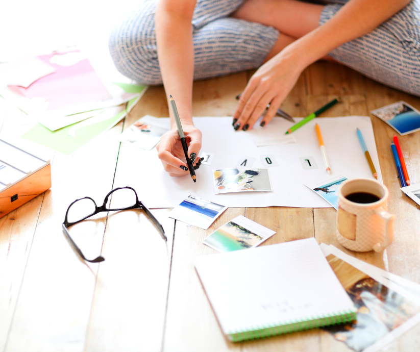 woman making scrapbook