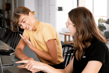 woman talking with teenager to illustrate talking about culture shock