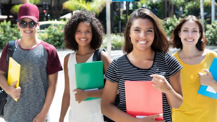 young teenage students smiling