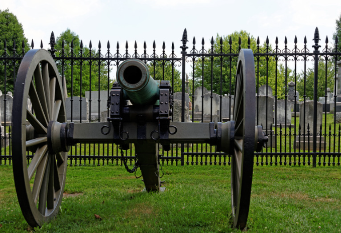 cannon in front of cemetary