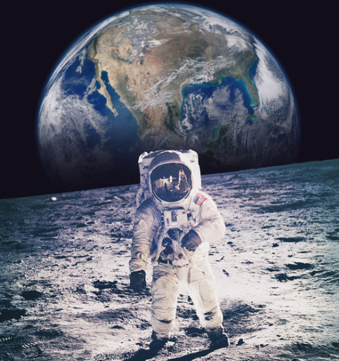 astronaut walking on moon with earth behind
