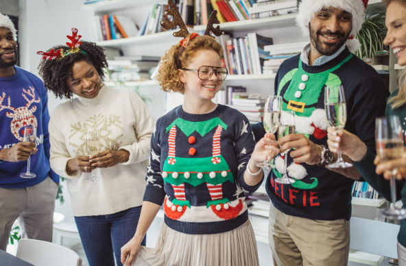 teen girl and adults wearing ugly sweaters