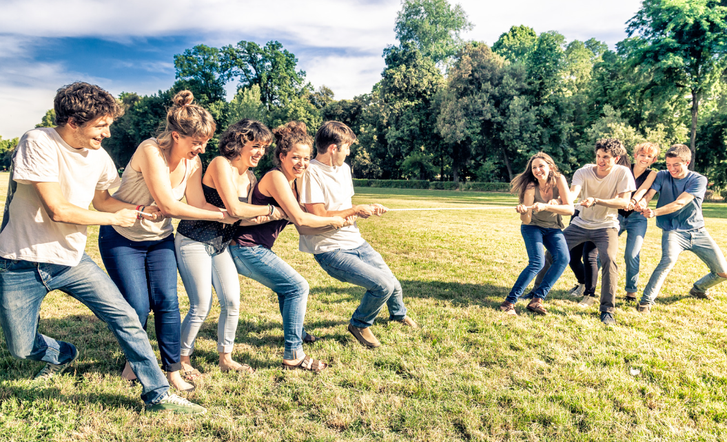 teens playing tug of war