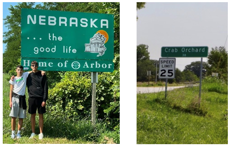 teen boys in front of Nebraska sign