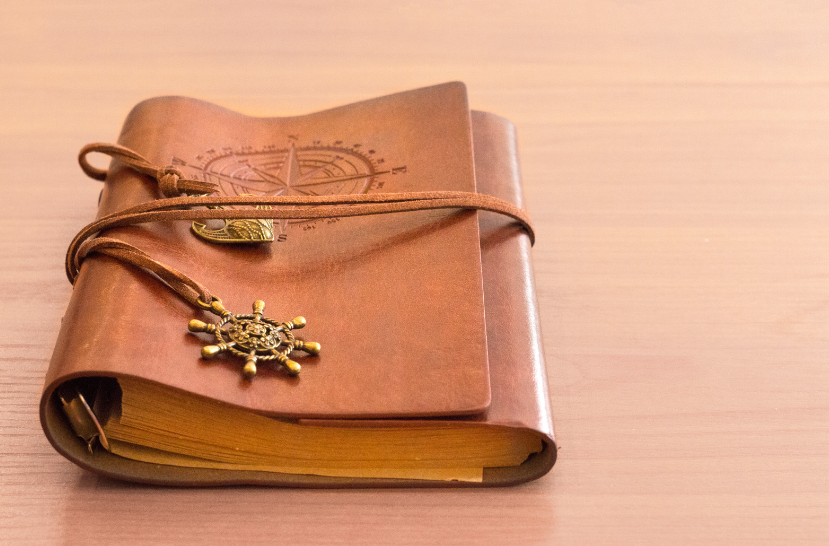leather journal with compass